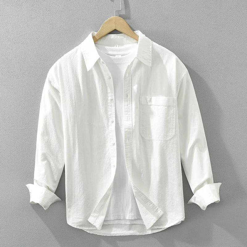 Classic men's long-sleeve button-down shirt with a relaxed fit for daily wear.