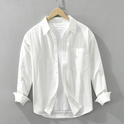 Classic men's long-sleeve button-down shirt with a relaxed fit for daily wear.