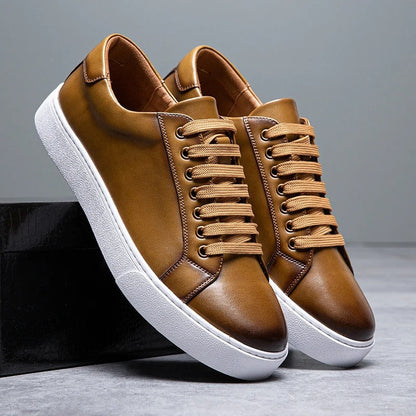 Polished men's versatile low-top sneakers, offering smart casual appeal & comfort. Modern everyday footwear.