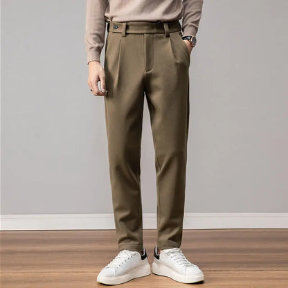 Stylish men's pleated dress pants, ideal for casual or formal wear. Wrinkle-resistant stretch fabric.