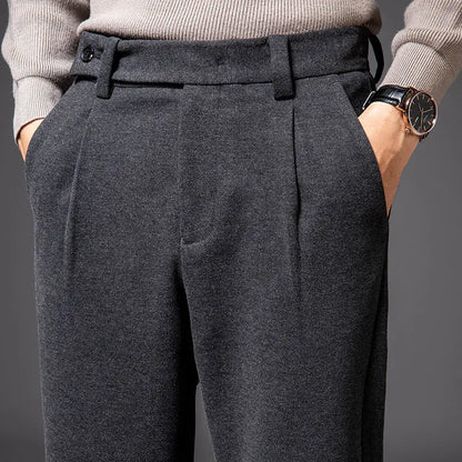 Men's fashion pleated pants, wrinkle-resistant and stretchy for all-day comfort. Available in multiple colors.