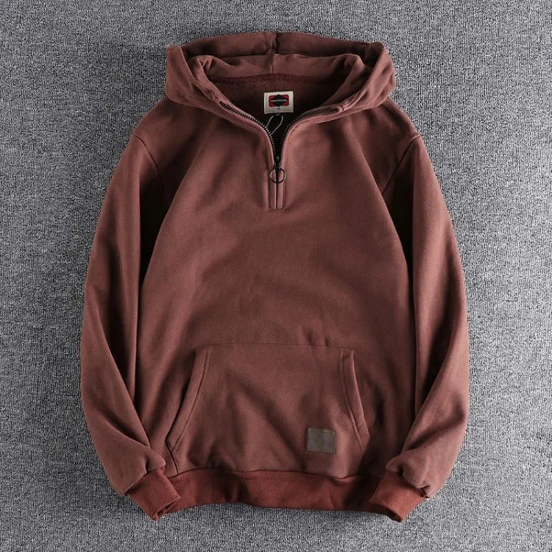 Men's versatile quarter-zip hoodie for everyday comfort, casual style & layering.