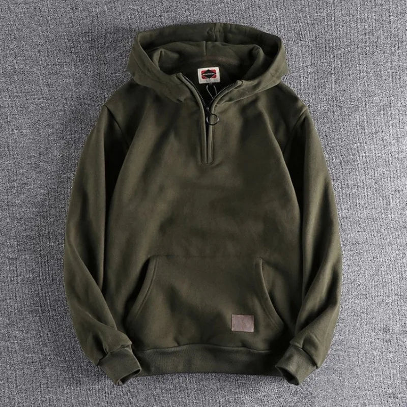 Stylish men's quarter-zip hoodie, a versatile layering piece offering warmth for spring & fall.