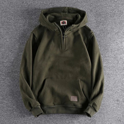 Stylish men's quarter-zip hoodie, a versatile layering piece offering warmth for spring & fall.