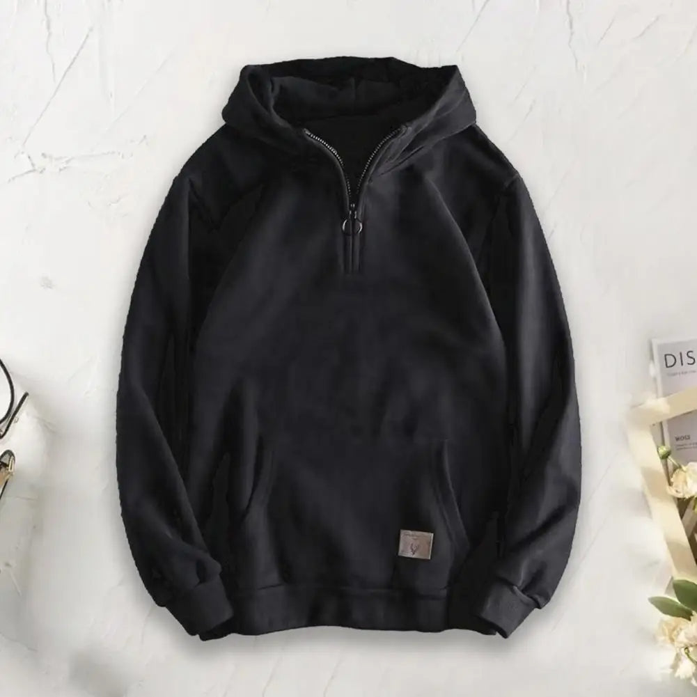 Soft men's quarter-zip pullover hoodie, designed for ultimate comfort and versatile layering outerwear.