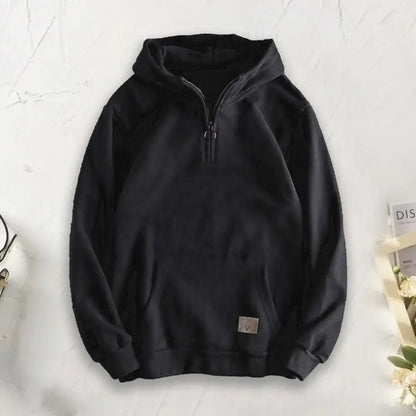 Soft men's quarter-zip pullover hoodie, designed for ultimate comfort and versatile layering outerwear.