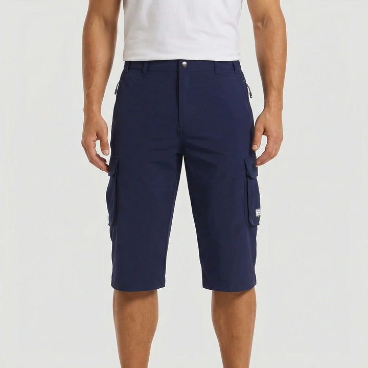 Close-up of quick-dry, breathable fabric on men's cargo shorts. Durable and comfortable for all outdoor activities.