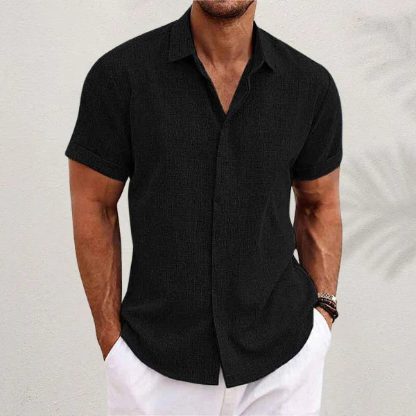Classic men's short-sleeve collared shirt with button-down front, versatile for any occasion.