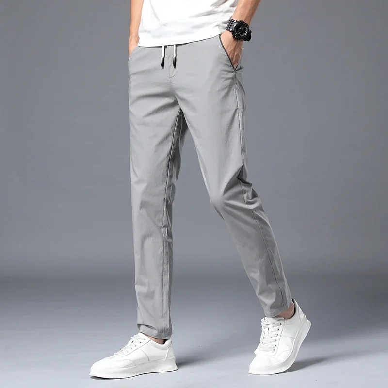 Everyday men's slim fit pants, known for their versatility, comfort, and wrinkle-resistant fabric.