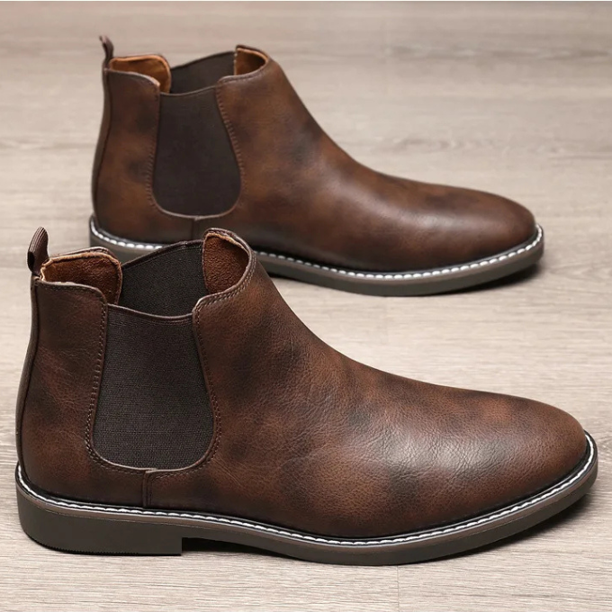 Comfortable men's Chelsea boots with easy slip-on design for versatile wear.