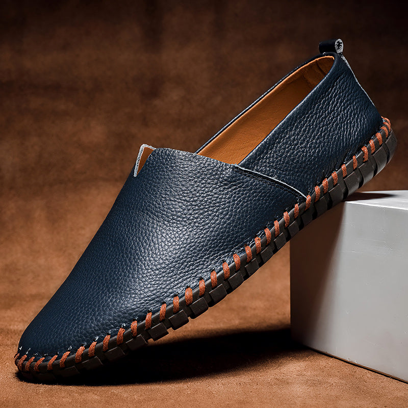 Stylish brown men's slip-on loafers, perfect for casual or dressy occasions.