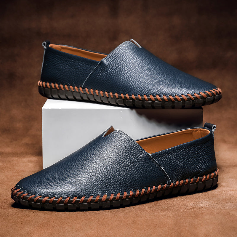 Modern white men's casual slip-on loafers, great for a fresh versatile look.
