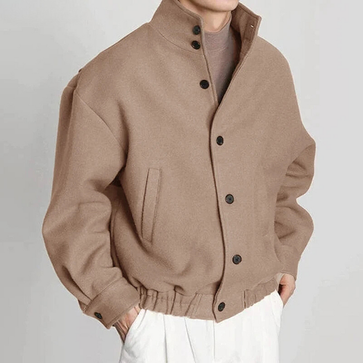 Black men's streamlined jacket. A versatile, lightweight outer layer for year-round casual and smart-casual men's fashion.