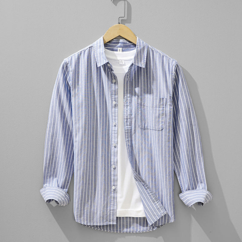 Men's versatile striped button-down shirt, perfect for smart casual or everyday wear. Long sleeve men's fashion.