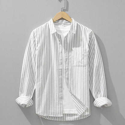 Stylish men's long sleeve button-down shirt with a classic striped pattern. Great for casual or smart-casual outfits.