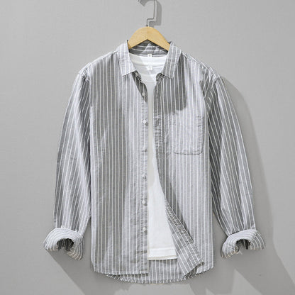 Casual men's striped long-sleeve button-down shirt for everyday wear. A versatile and stylish addition to men's fashion.