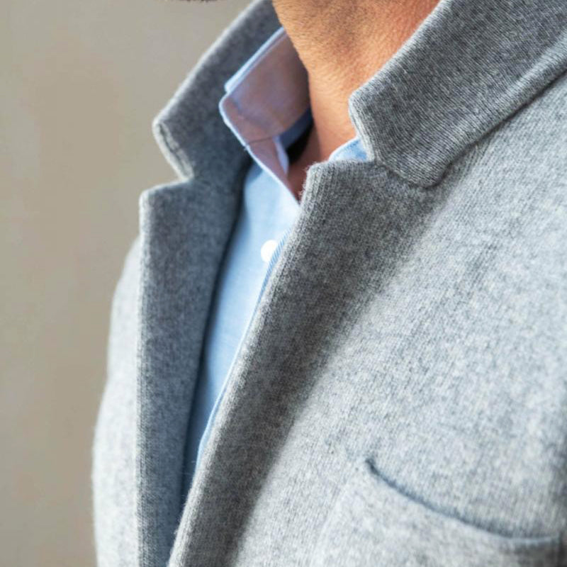 Modern men's smart casual blazer, a comfortable jacket with distinctive patch pockets for a tailored everyday fit.