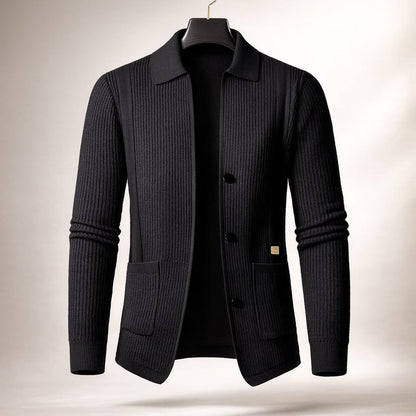 Model wearing a men's versatile textured cardigan, a long-sleeve, button-front collared sweater for everyday comfort.