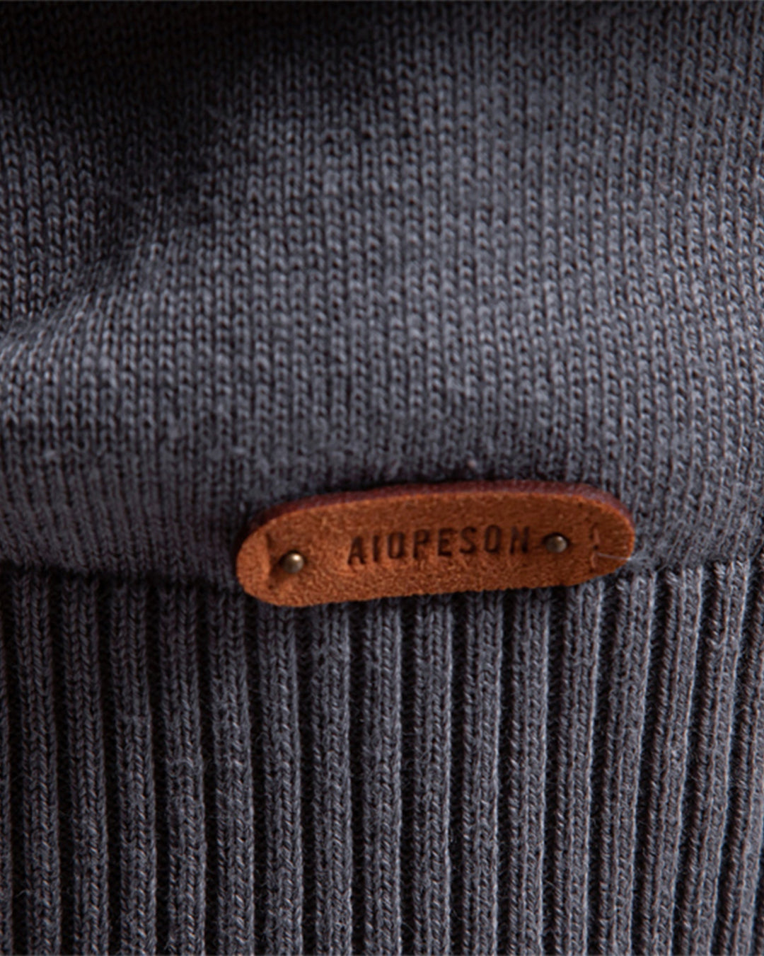 Versatile men's crew neck with intricate textured knit, great for layering.