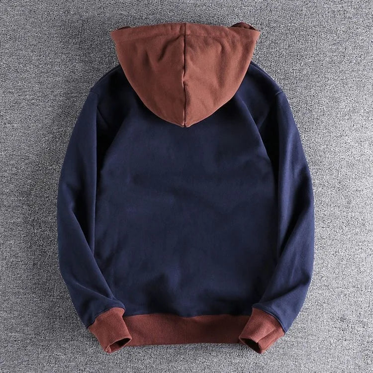 Comfortable men's quarter-zip pullover hoodie. Ideal hooded sweatshirt for everyday casual and urban apparel.