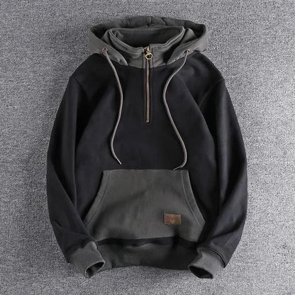 Everyday men's quarter-zip apparel. A comfortable, two-tone zipper hoodie, perfect for versatile casual and urban outfits.