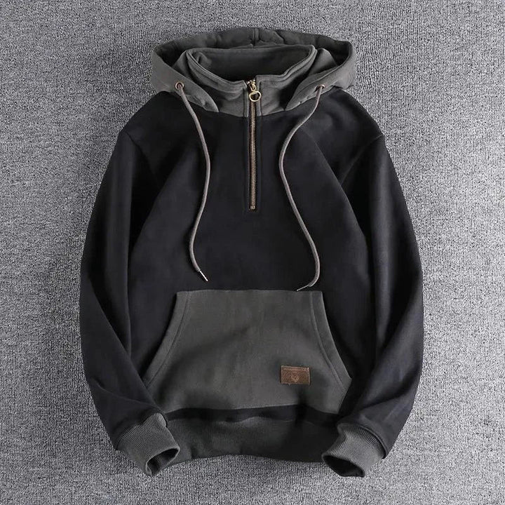 Everyday men's quarter-zip apparel. A comfortable, two-tone zipper hoodie, perfect for versatile casual and urban outfits.
