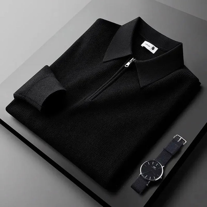Stylish men's quarter-zip waffle knit long-sleeve top, perfect for a smart casual look or layering during cooler weather.