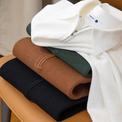 Back view of a well-fitting men's waffle knit quarter-zip shirt, highlighting its comfortable and versatile design.