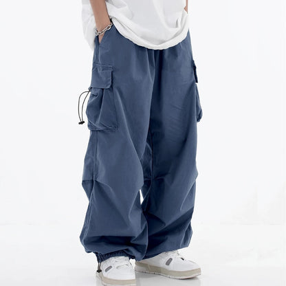 Men's versatile wide-leg cargo pants for urban streetwear, comfortable utility style.