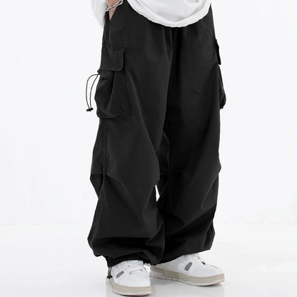 Men's wide-leg cargo pants with drawstring cuffs, perfect for urban fashion.