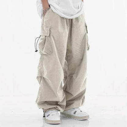 Versatile men's wide-leg cargo pants, essential for streetwear and comfortable daily wear.