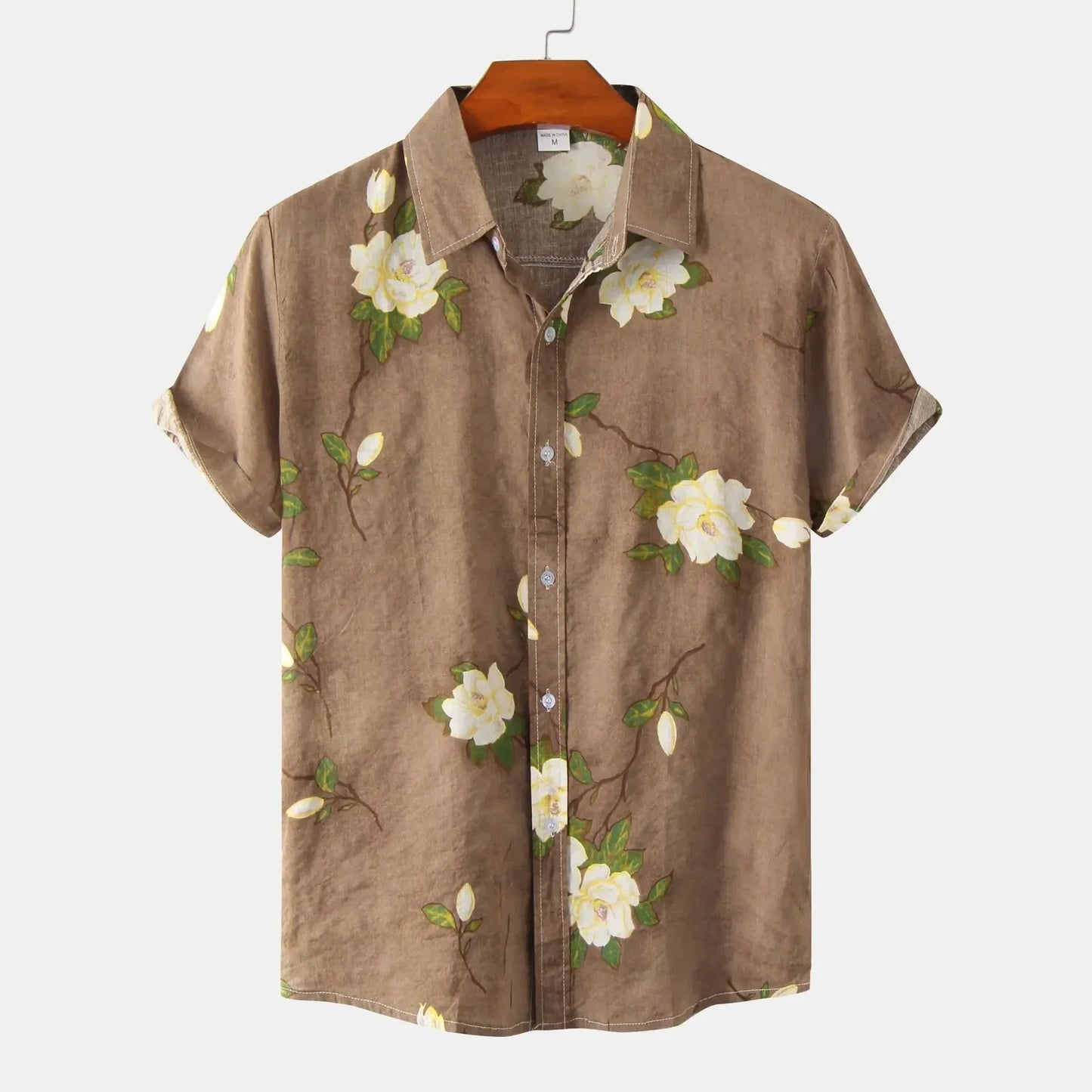 Relaxed fit men's summer shirt featuring a vibrant Amalfi floral print in green, yellow, red, and brown; short sleeve.