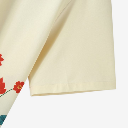 Intricate vibrant floral print close-up on men's casual short sleeve button-up shirt, a summer fashion statement.