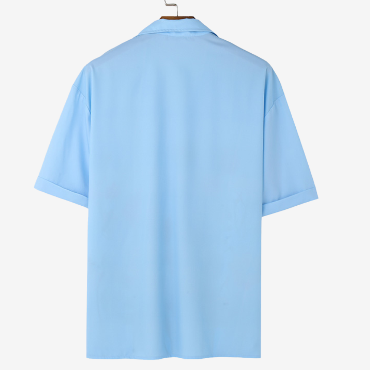 Men's vibrant floral short sleeve button-up shirt, neatly folded, ready for summer travel or everyday style.