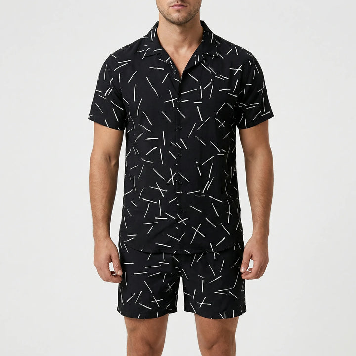 Close-up of vibrant graphic print on men's relaxed fit summer shirt & shorts two-piece set.