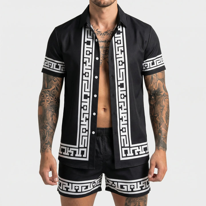 Men's printed summer two-piece set featuring a relaxed fit graphic shirt and matching shorts.