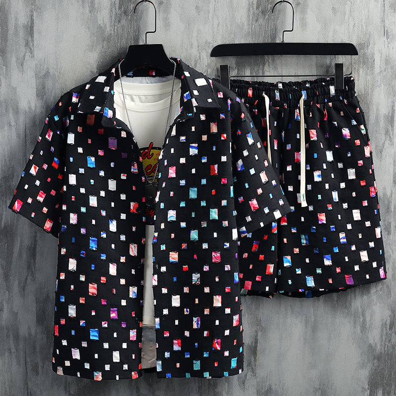 Comfortable men's vibrant frayed casual set, perfect two-piece leisurewear outfit for modern summer fashion.