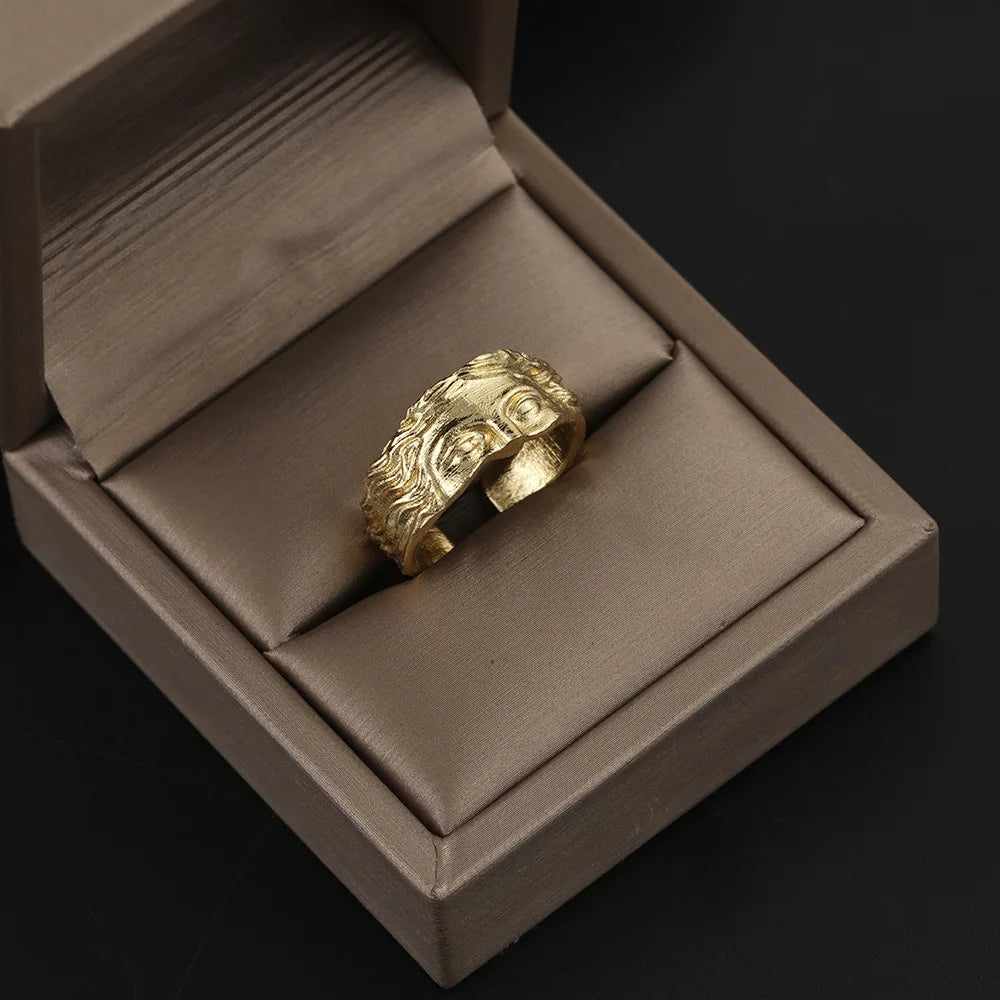 Close-up of men's vintage Aphrodite stainless steel ring. Resizable durable band with intricate design.