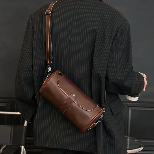 Men's Vintage Barrel Shoulder Bag, durable PU leather cross-body travel accessory.