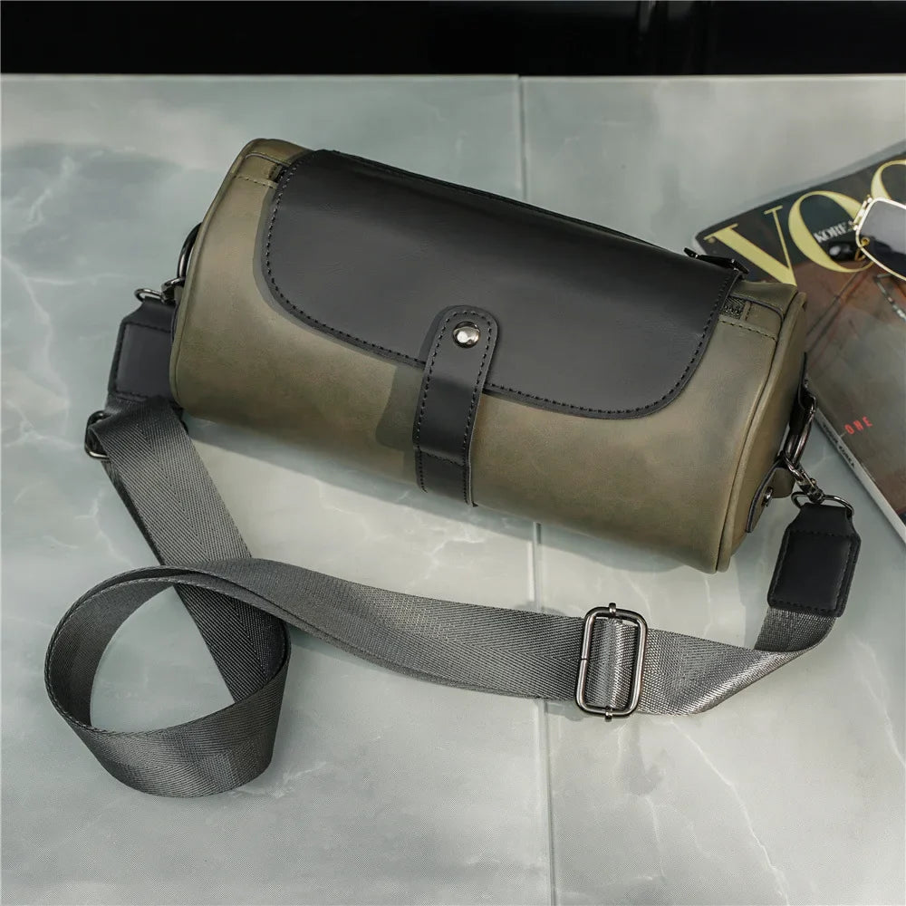 Elegant men's vintage barrel shoulder bag. Stylish PU leather cross-body accessory, durable for daily use.
