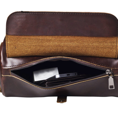 Unique barrel-shaped men's vintage shoulder bag. Durable PU leather cross-body, stylish travel accessory.