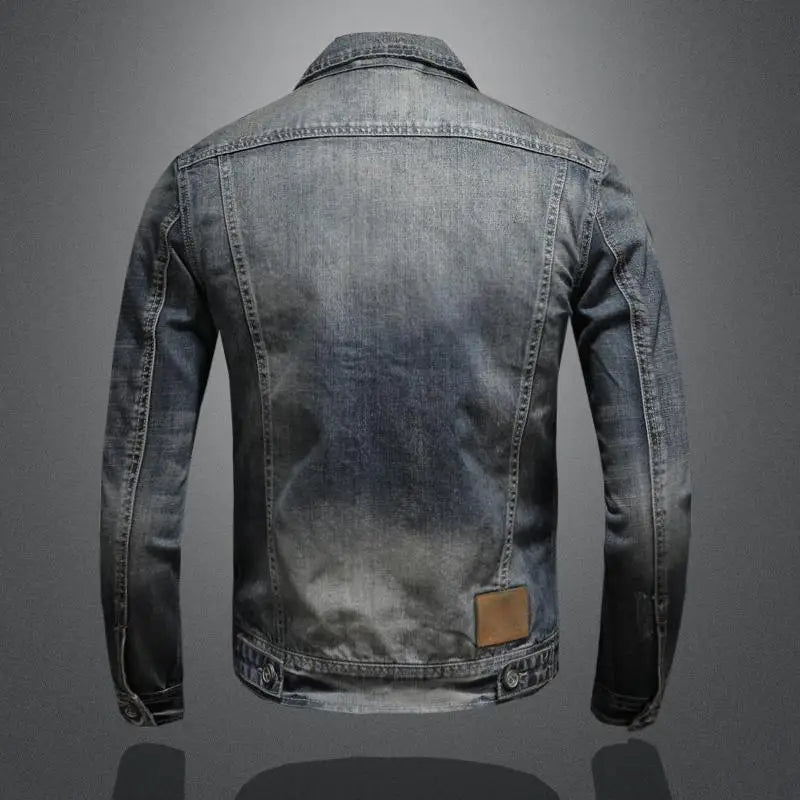 Classic men's vintage denim jacket with button closure. Durable casual outerwear for retro style.