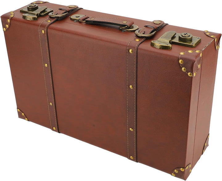 Heritage brown men's vintage leather travel trunk. Stylish carry-on overnight bag with secure clasps.