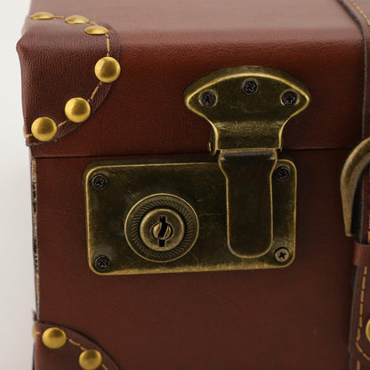 Vintage men's heritage brown leather carry-on case, ideal for overnight travel. Compact and secure.