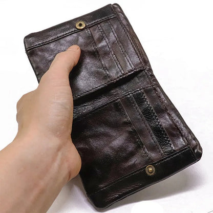 Ultra-slim men's vintage leather bifold wallet, durable construction for front pocket carry. Rugged.