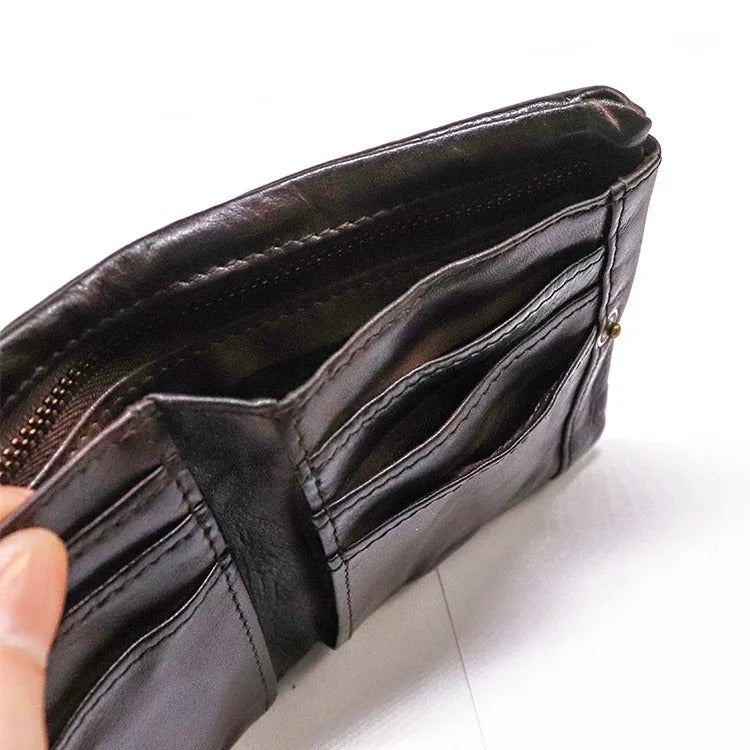 Heavy-duty men's vintage leather bifold wallet, rugged and durable for long-lasting use. Slim design.