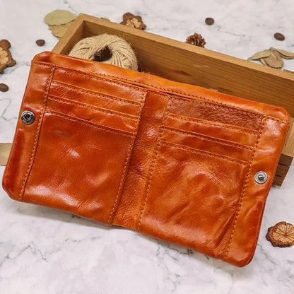 Distinctive vintage look men's leather bifold wallet, slim profile, and rugged durability for men.