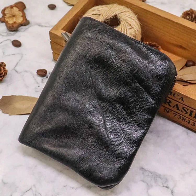 Secure snap closure on a men's vintage leather bifold wallet, slim and durable for all essentials.