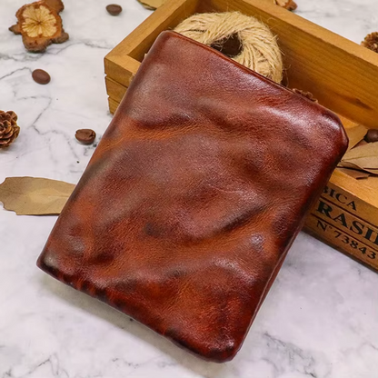 Premium vintage leather men's bifold wallet, slim & durable, built to last. Rugged design.