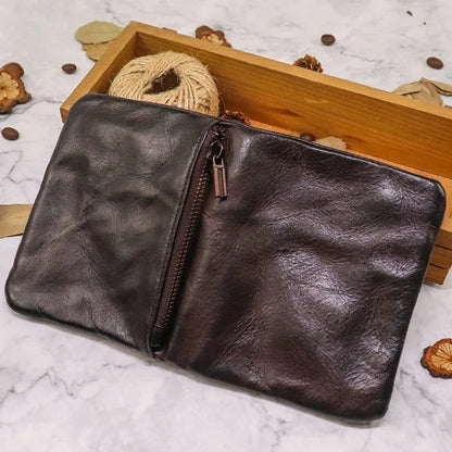 Classic vintage style men's leather bifold wallet with secure snap closure. Slim & durable.